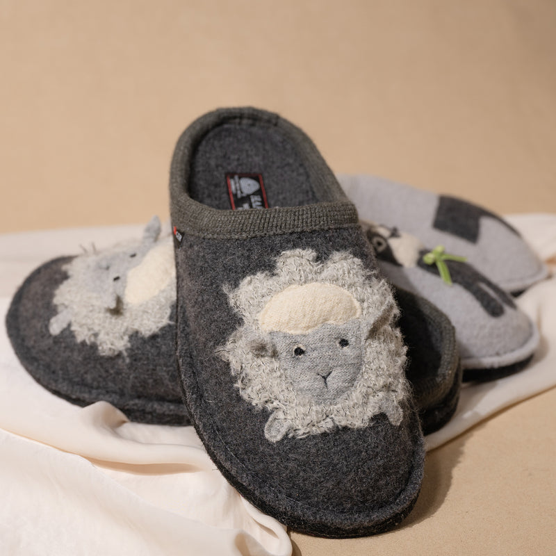 Group photo of Women's Haflinger Lamby Soft and Cozy Wool Slipper in Gray and Haflinger Puppy slipper, great gifts for her.