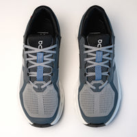 Overhead lace and heel cap view of the Men's On Running Cloudrunner 2 in Alloy / Chambray