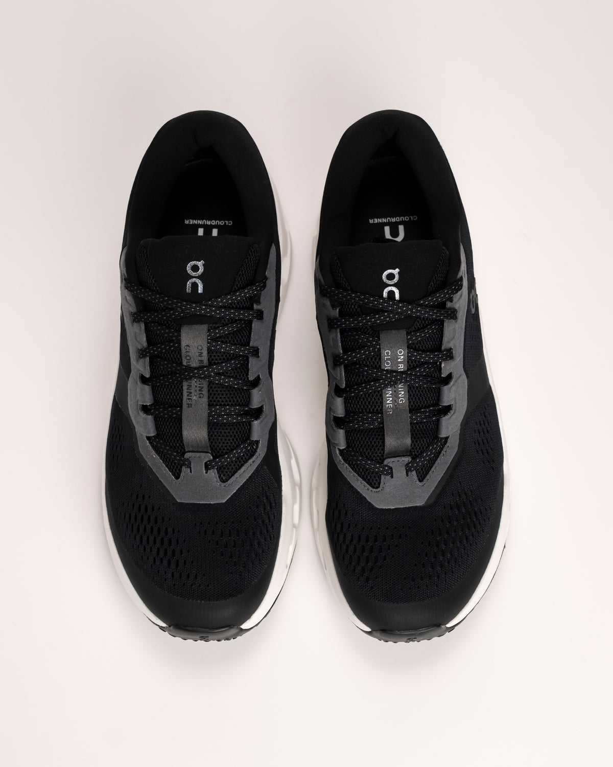 Men’s On Cloudrunner 3 – Stable Cushioned Road Running Shoe in Black / Ivory

The On Cloudrunner 3 is designed for runners who want a stable, supportive ride without sacrificing comfort. This updated version features a wider base and reinforced heel clip to enhance balance and control, making it a reliable choice for everyday road running.