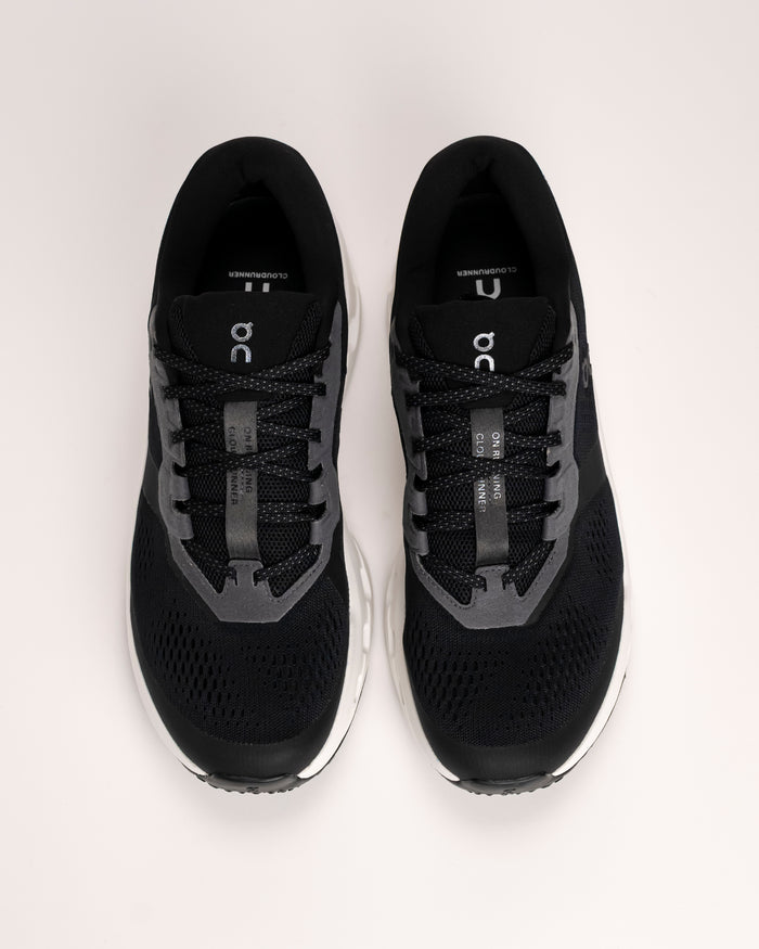 Men’s On Cloudrunner 3 – Stable Cushioned Road Running Shoe in Black / Ivory

The On Cloudrunner 3 is designed for runners who want a stable, supportive ride without sacrificing comfort. This updated version features a wider base and reinforced heel clip to enhance balance and control, making it a reliable choice for everyday road running.