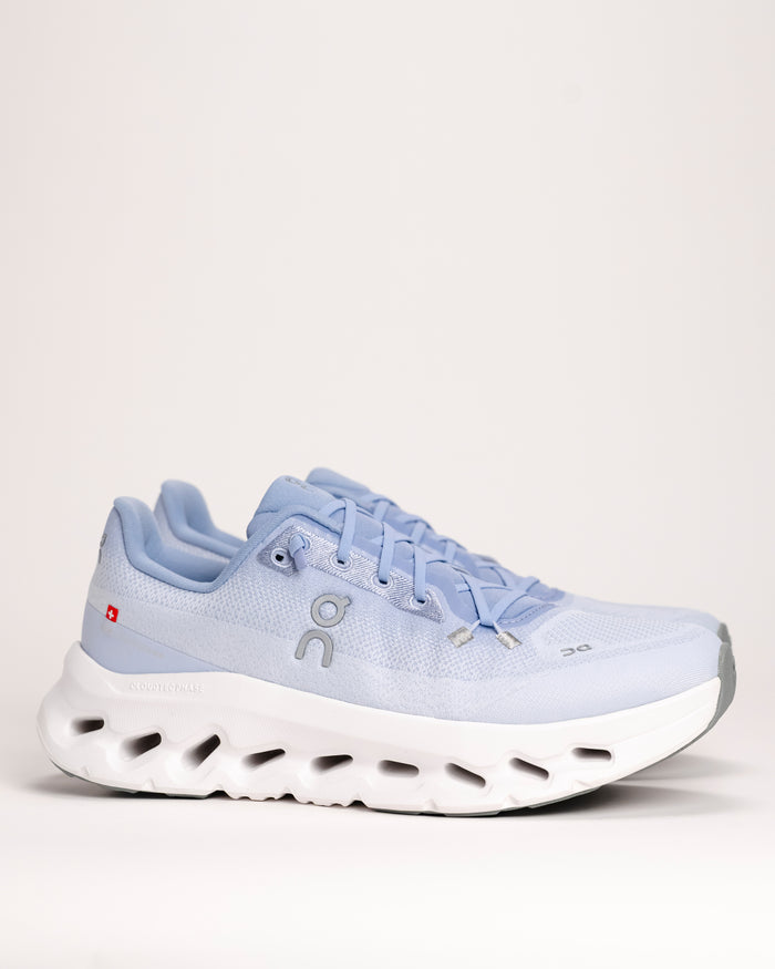 Women’s On Cloudtilt lifestyle sneaker in Marsh/Heather with white sole on a light gray background
