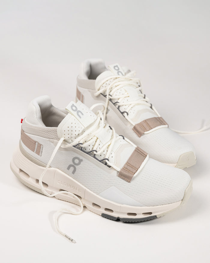 Close-up of the On Running Cloudnova 2 Sneaker in Ice/Sand, showcasing the engineered mesh upper for breathability and modern aesthetics.