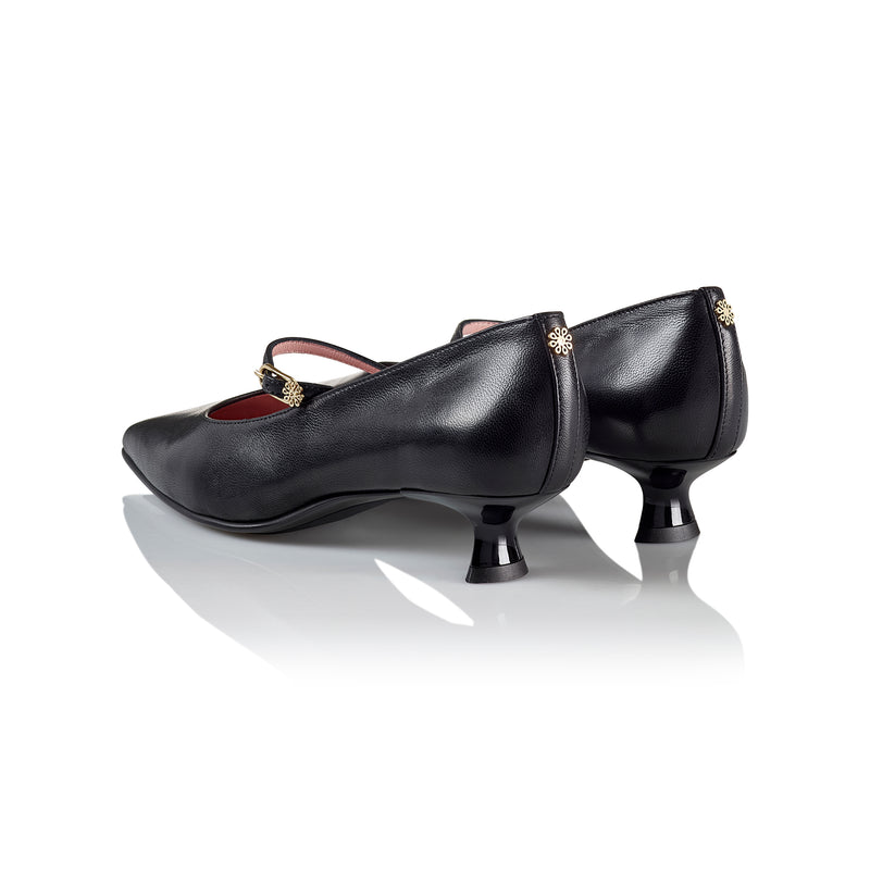 Back view of the Rosalie - Ayelet by Naot pump, showing the 1.3-inch triangular kitten heel and elegant detailing in smooth Italian leather.