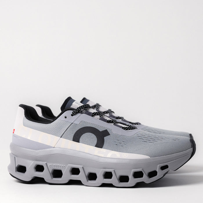 Men's On Running Cloudmonster in Alloy/Silver, side profile showing CloudTec® cushioning and sleek upper design.