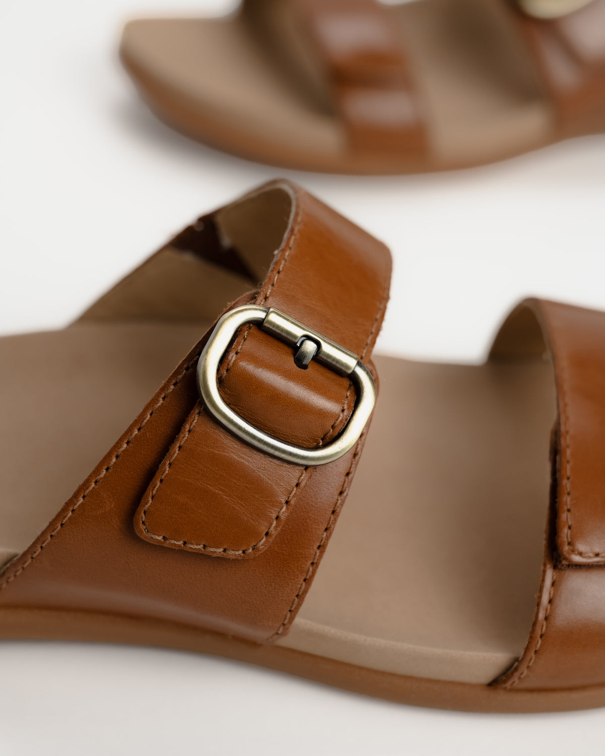 Dansko Justine Leather Slide Sandal in Luggage Brown