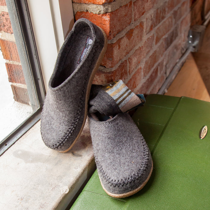 Detail shot of the Men's Haflinger Fletcher offering a premium comfort slipper with an anatomically contoured removable footbed and a cushioned rubber sole that will add the ultimate spring to your step. 