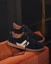 Women's Gabor City Sneaker 73.300.17 in Black on a velvet sofa