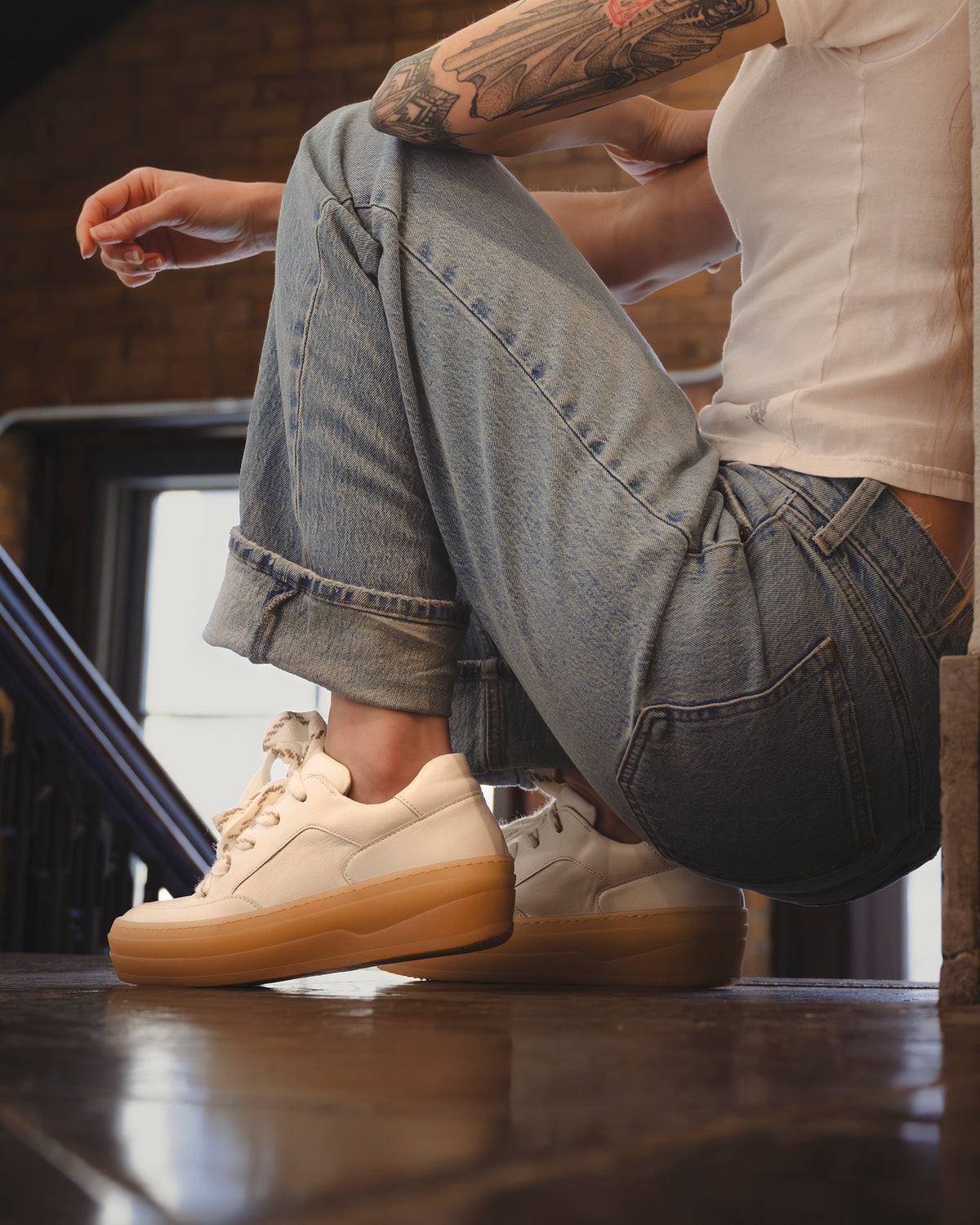 Lifestyle image of a woman wearing the Gabor Chunky Platform in White Leather Women’s Sneaker