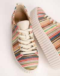 The Gabor Lamia 82.205.40 is a high-fashion take on the classic low-top trainer, designed to be the centerpiece of any summer outfit. This 83.205.40 model features a vibrant, multicolor raffia upper that offers a unique tactile texture rarely seen in athletic footwear. By blending sporty lines, artisanal materials, and comfort technology, Gabor has created a "sporty elegance" that works just as well for a garden party as it does for a city walk.