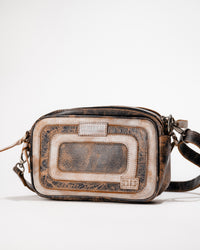 Front view of Bed|Stü Shy compact leather crossbody bag showing rectangular shape and leather overlays