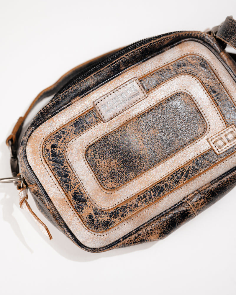 Front view of Bed|Stü Shy compact leather crossbody bag showing rectangular shape and leather overlays