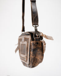 Side view of Bed|Stü Shy bag with adjustable crossbody strap attached