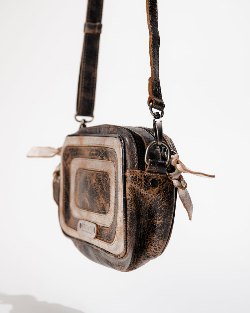 Side view of Bed|Stü Shy bag with adjustable crossbody strap attached