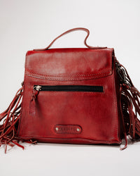 Back side view highlighting back zipper pocket and logo badge on Hidden leather bag