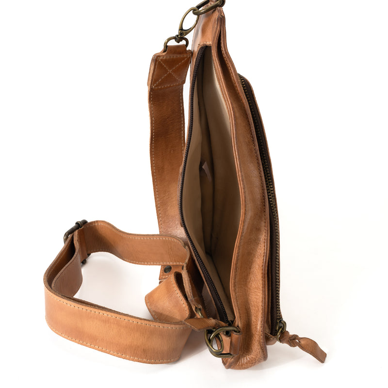 Interior view of the BED|STU Adept Crossbody Bag, featuring organized compartments for essentials and handmade one-of-a-kind finishes. Tan DD is made from chrome and formaldehyde-free, vegetable-tanned leather.