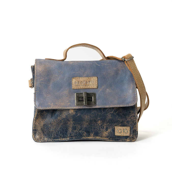 Front view of the BED|STU Improv Handbag in vegetable-tanned leather, showcasing its compact rectangular shape and stylish design.