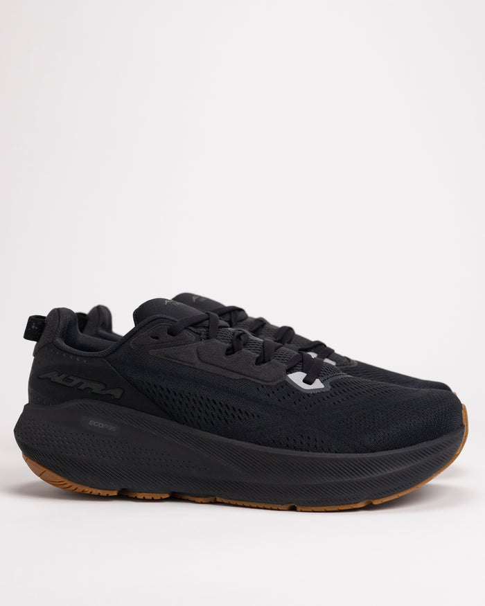 Side view of men’s Altra FWD VIA 2 road running shoe showing cushioned EGO™ P35 midsole in All Black color