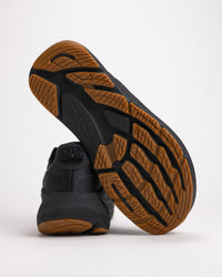 Detail shot of the grippy outsole on the men’s Altra FWD VIA 2 in black designed for on road running traction
