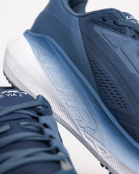Close up of the Altra cushioned EGO™ P35 midsole on the navy FWD VIA 2 road running shoe