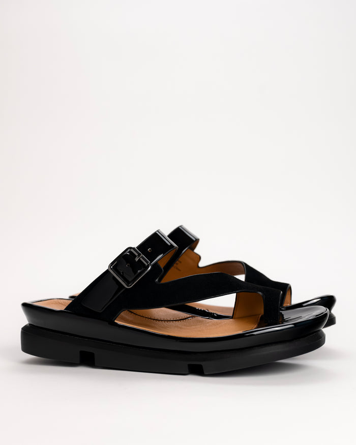 L’Amour Des Pieds Alanza slip-on toe loop sandal in black leather, side view on white background