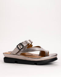 L’Amour Des Pieds Alanza slip-on toe loop sandal in Champagne leather, side view on white background