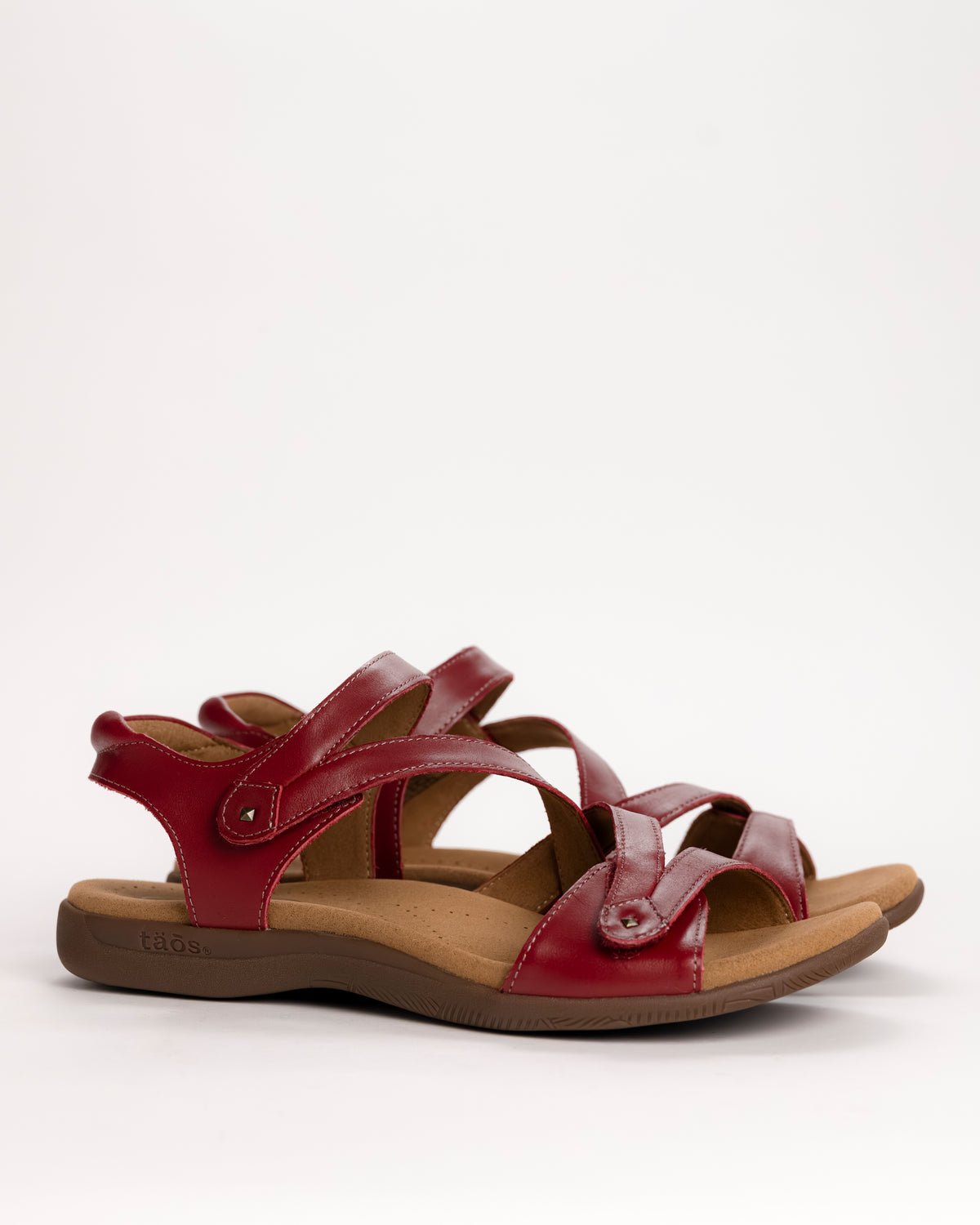 Side view of the Women’s Taos Big Time Leather Comfort Sandal in Red on a white background