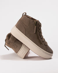 Side view of the Women's Aetrex Gianna Platform Sneaker in Taupe, showing the zip and lace design with subtle leather texture