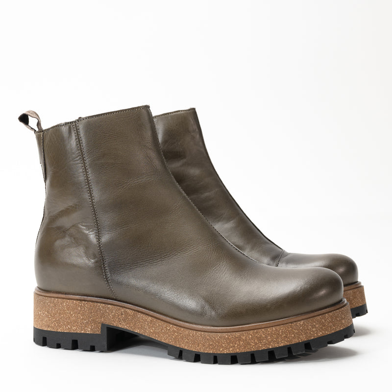 Stylish and comfortable Women's Taos Downtown Boot made in Portugal featuring full-grain leather and eazy-on side zipper.