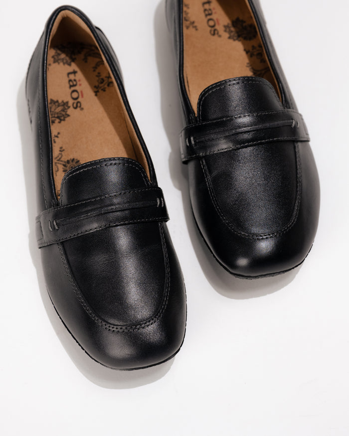 Overhead detail view of the almond stitched toe on the Women’s Taos Gabby Loafer – Soft Leather Slip-On in Black