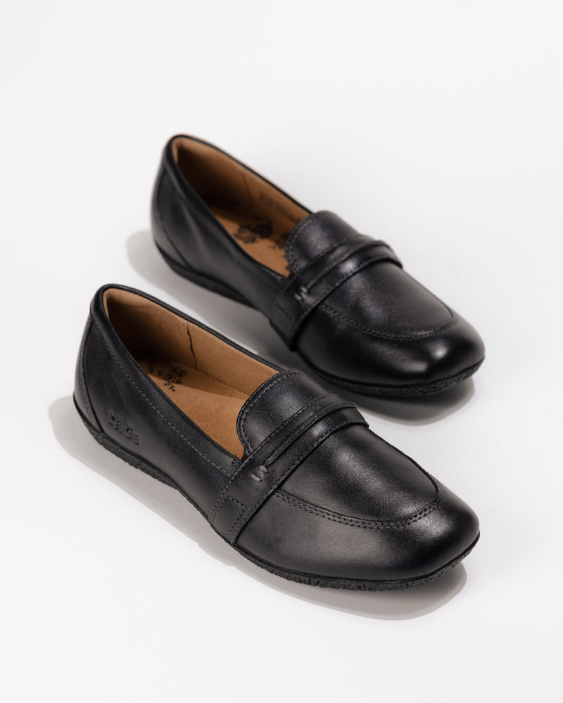 Slight overhead front view of the classic Women’s Taos Gabby Loafer – Soft Leather Slip-On in Black
