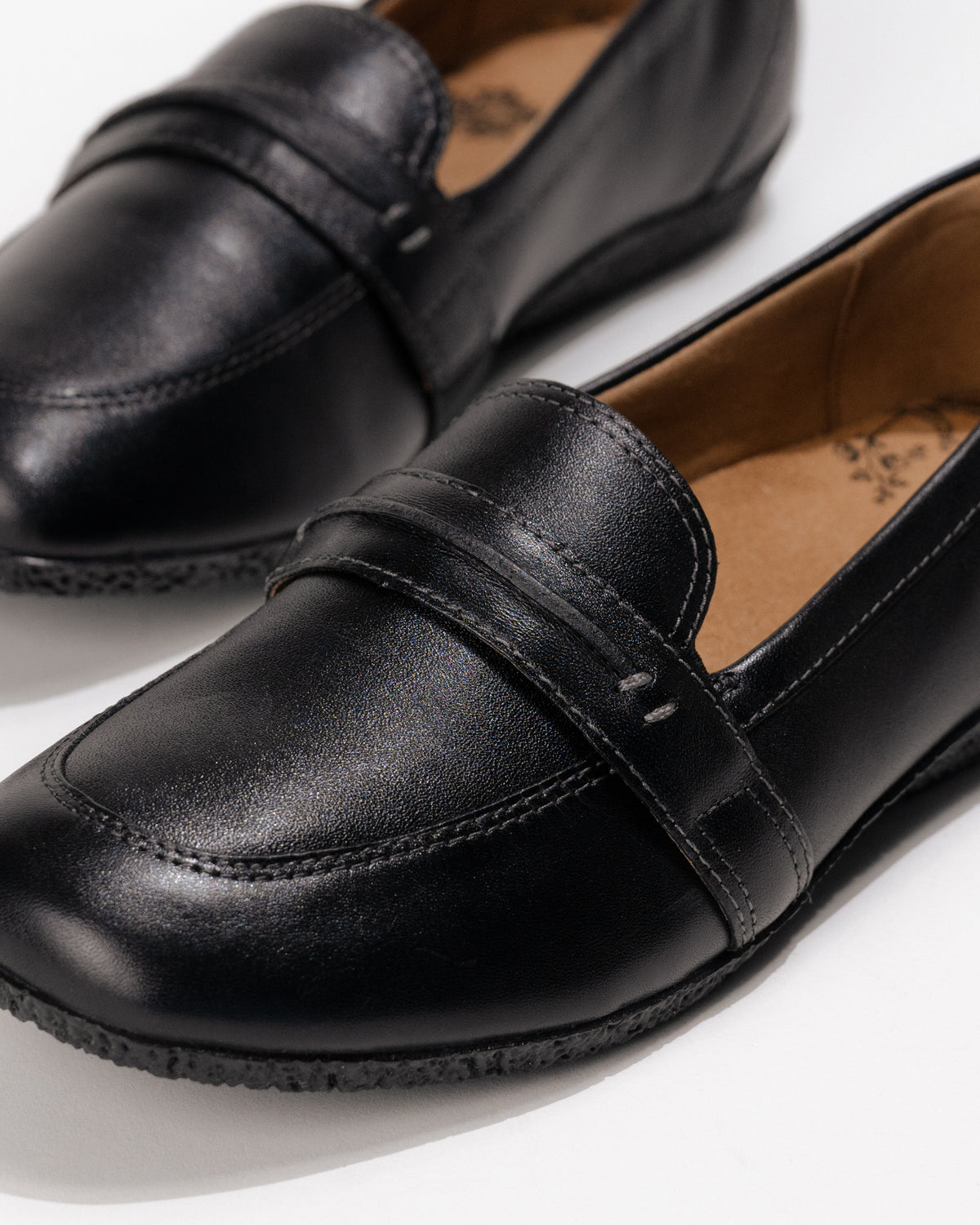 Close-up front detail on the Women’s Taos Gabby Loafer – Soft Leather Slip-On in Black