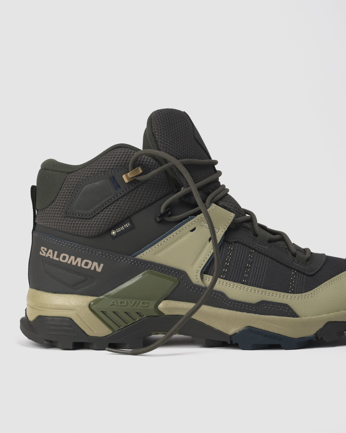 Back angle highlighting ankle collar and heel design of Salomon trail boot