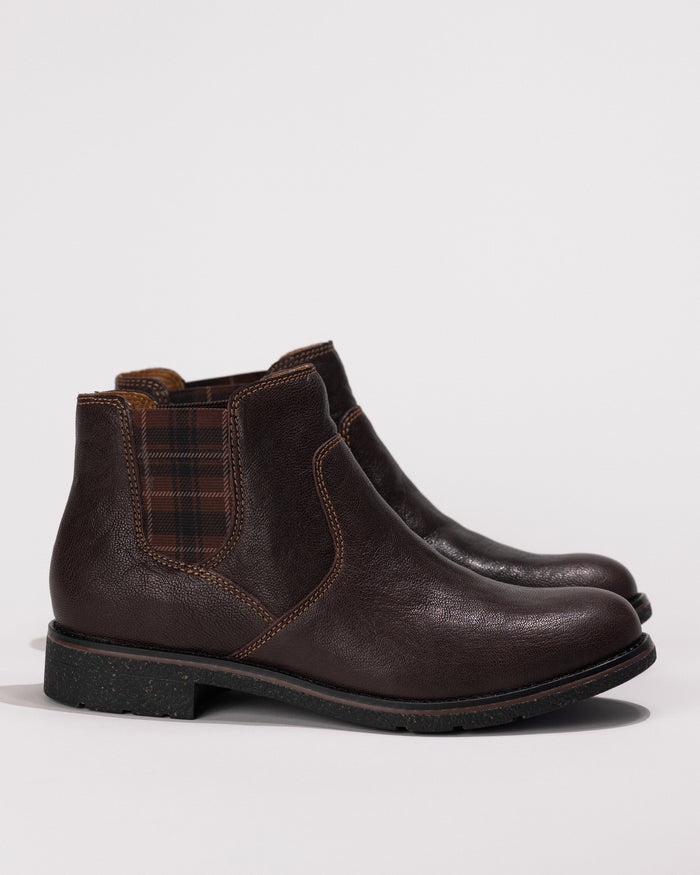 Side view of the Aetrex Kaylee Chelsea Boot in dark brown leather with stretch gore and low heel