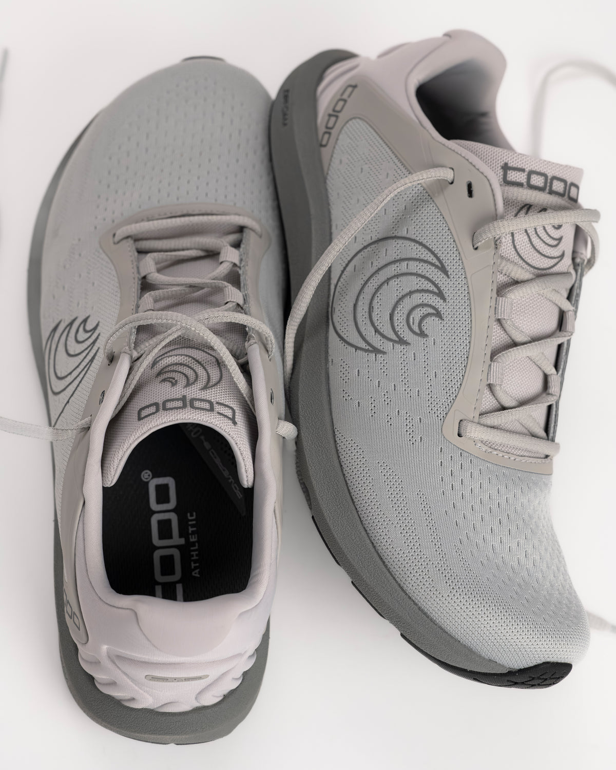 The Topo ST-6 is built for the runner who prefers a "less is more" approach. It’s the most minimalist model in Topo’s road lineup, sitting on a low-profile 14mm platform with absolutely zero drop from heel to toe. This design is all about promoting a natural, grounded gait while providing just enough ZipFoam™ cushioning to take the sting out of the pavement. If you’re looking for a shoe that lets your foot move exactly how it was meant to, this is a top contender.