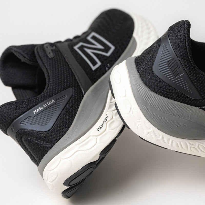 Rear angle highlighting the ROLLBAR® stability post system on the New Balance Fresh Foam X 1540 V4.