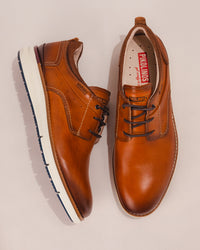 Top view showing breathable leather and textile blend with padded collar