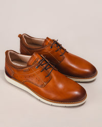 Top view showing breathable leather and textile blend with padded collar