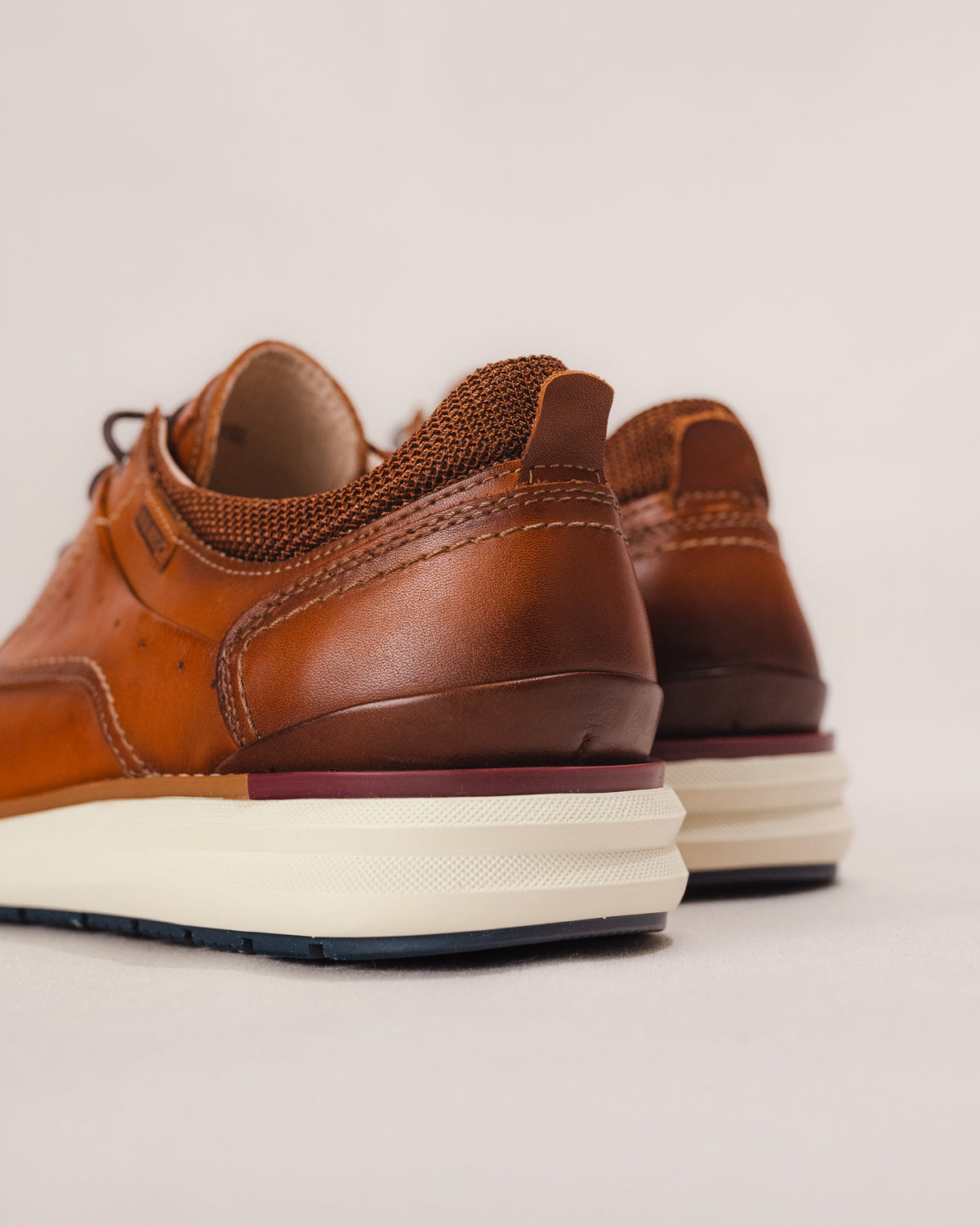 Heel view highlighting lightweight outsole and eco-certified construction