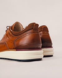 Heel view highlighting lightweight outsole and eco-certified construction