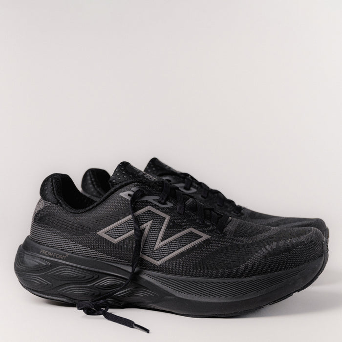 Side profile view of the Men's New Balance Fresh Foam X 880v15, M880K15 in Black