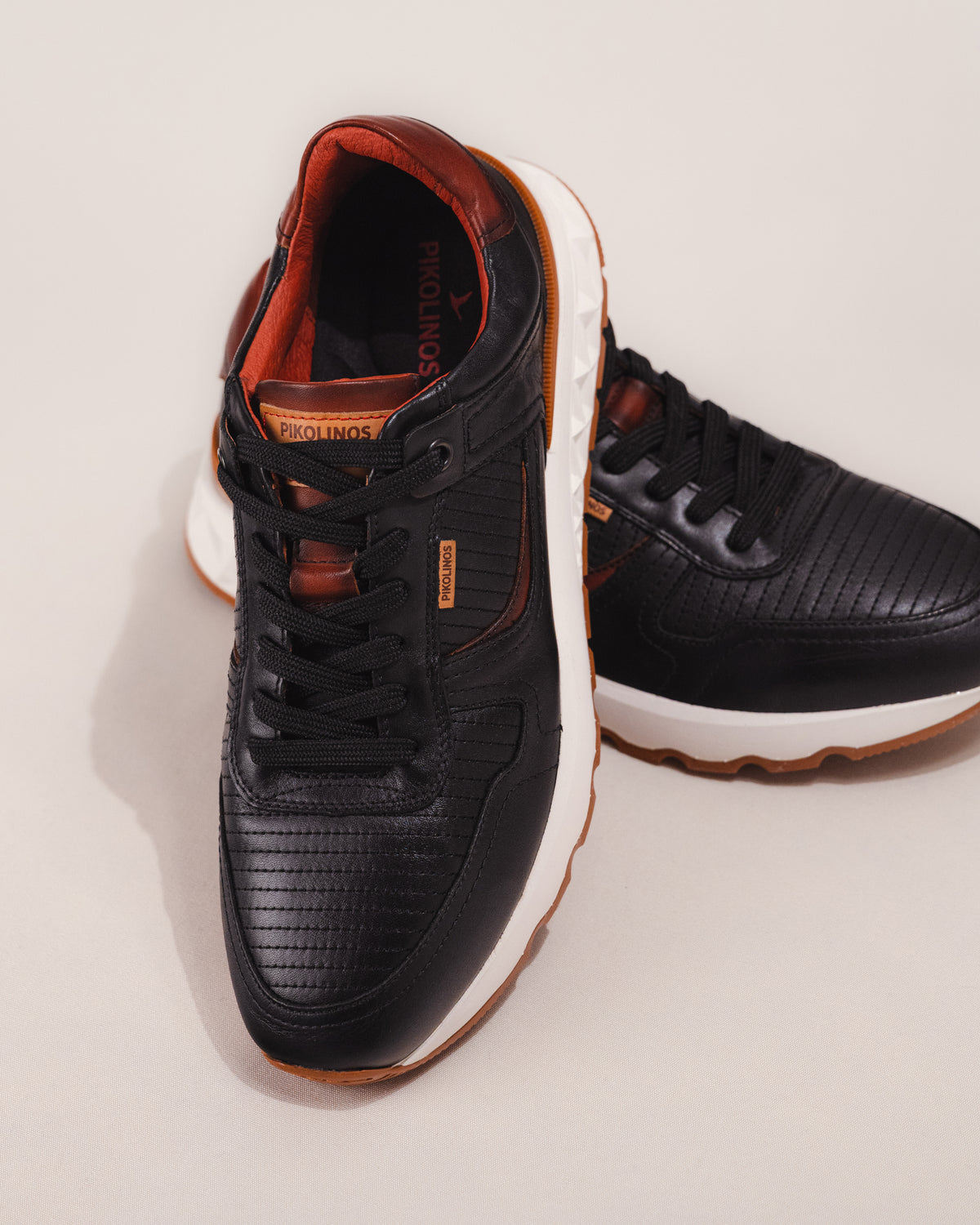 Detail of leather upper and lace closure on Pikolinos ARANDA sneaker