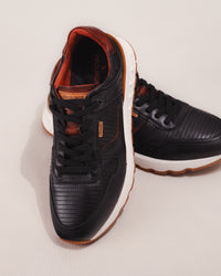 Detail of leather upper and lace closure on Pikolinos ARANDA sneaker