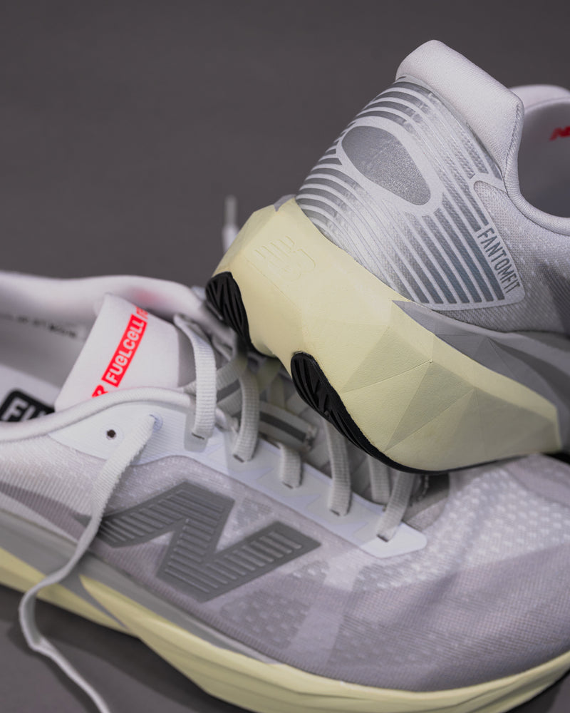 Men’s New Balance FuelCell Rebel v5 in Raincloud with Mineral and White – Lightweight Neutral Trainer back close-up