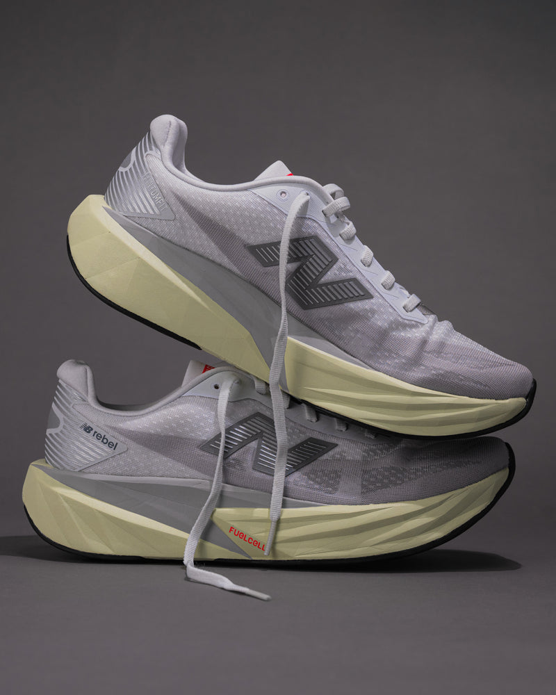 Men’s New Balance FuelCell Rebel v5 in Raincloud with Mineral and White – Lightweight Neutral Trainer side view