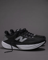 Men’s New Balance FuelCell Rebel v5 in Black/White – Lightweight Neutral Trainer