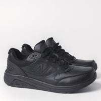 Front detail of the men's New Balance 928 V3 walking shoe in black leather.