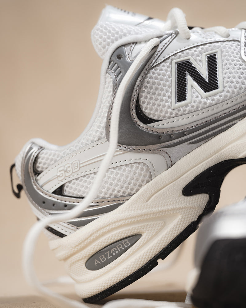 New Balance 530 Sneaker in Silver Metallic with Black Cement