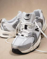 New Balance 530 Sneaker in Silver Metallic with Black Cement