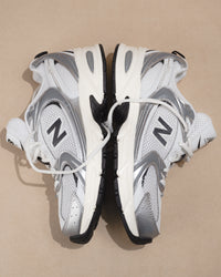 New Balance 530 Sneaker in Silver Metallic with Black Cement