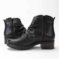 Taos Ravelle ankle bootie in soft leather with side zipper and ruched detail.